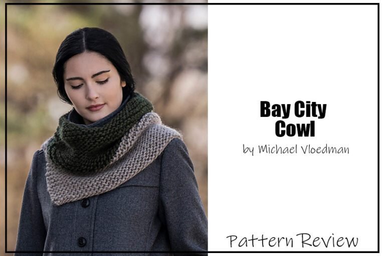 Bay City Cowl by Michael Vloedman knitting pattern sample made with a dark green yarn and a grey yarn. modeled on a woman.