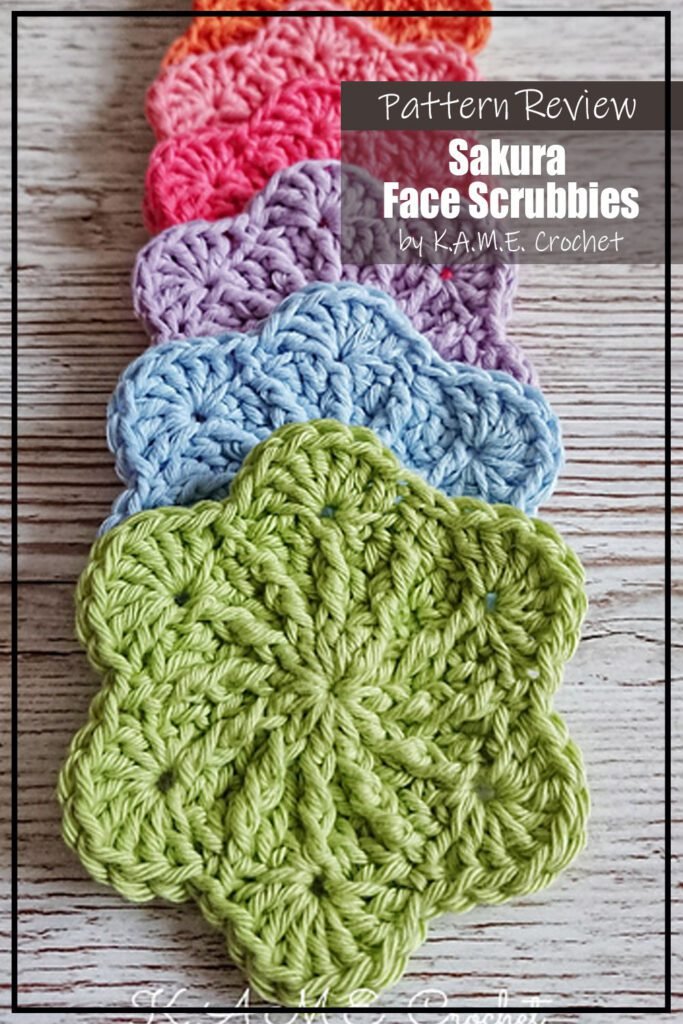 Crochet pattern samples. An assortment of scrubbies that are shaped like cherry blossoms in a rainbow array of colours. Text on the image says "Sakura Face Scrubbies by KAME Crochet Pattern Review"