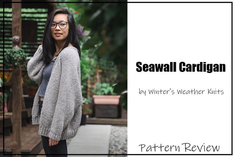 Seawall Cardigan by Winter's Weather Knits knitting pattern sample is a great oversized cardigan modeled by a woman with long black hair standing outside on a porch or patio