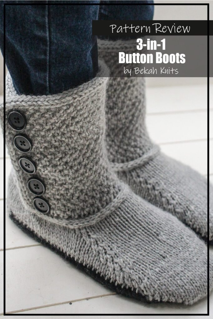 3 in 1 Button Boots knit pattern sample is made using a grey yarn for the upper part of the slipper and black for the sole. The slippers also feature black buttons. These slippers can be worn in different ways and in this photo the cuff is upright and fully buttoned. The slippers are models by someone wearing jeans. The text on the image reads "3-in-1 Button Boots by Bekah Knits Pattern Review".
