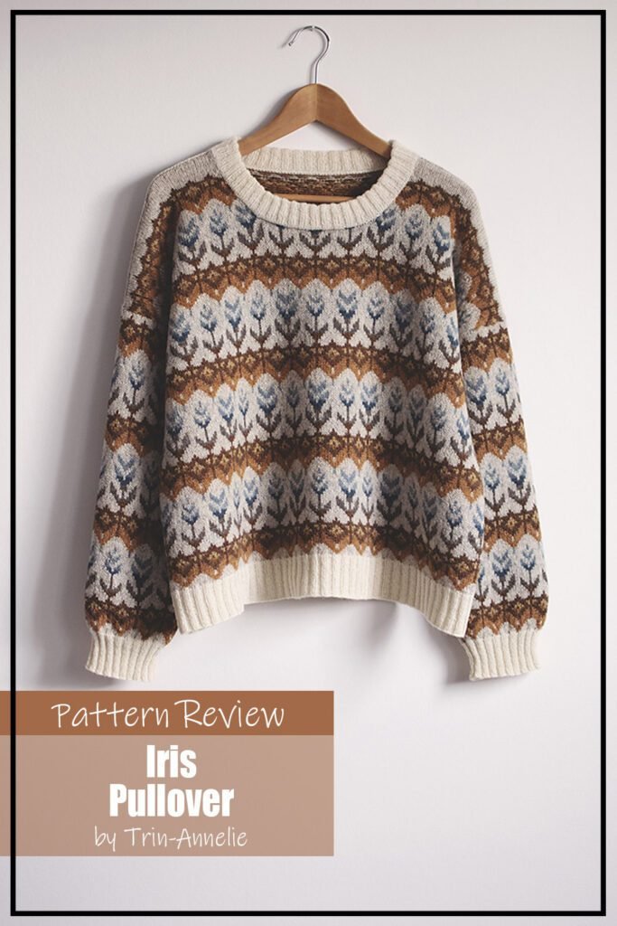 The Iris pullover knitting pattern sample is made using cream yarn as the background, a browns and greys for the main motif which is an iris flower on a decorative stripe. The text reads "Iris Pullover by Trin-Annelie Pattern Review"
